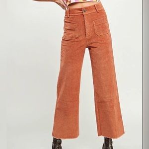 Boho wide leg rust high waisted corduroy pants. Made by Miss Love. Size large